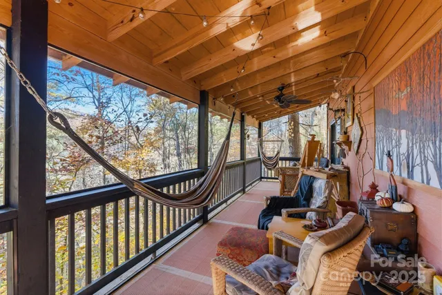 a view of swimming pool with seating area