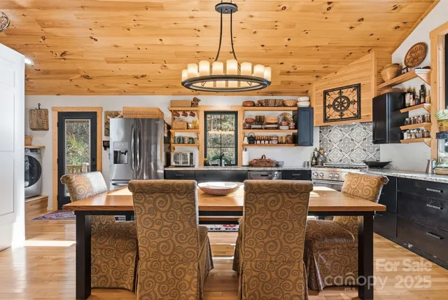 a dining room with furniture and window