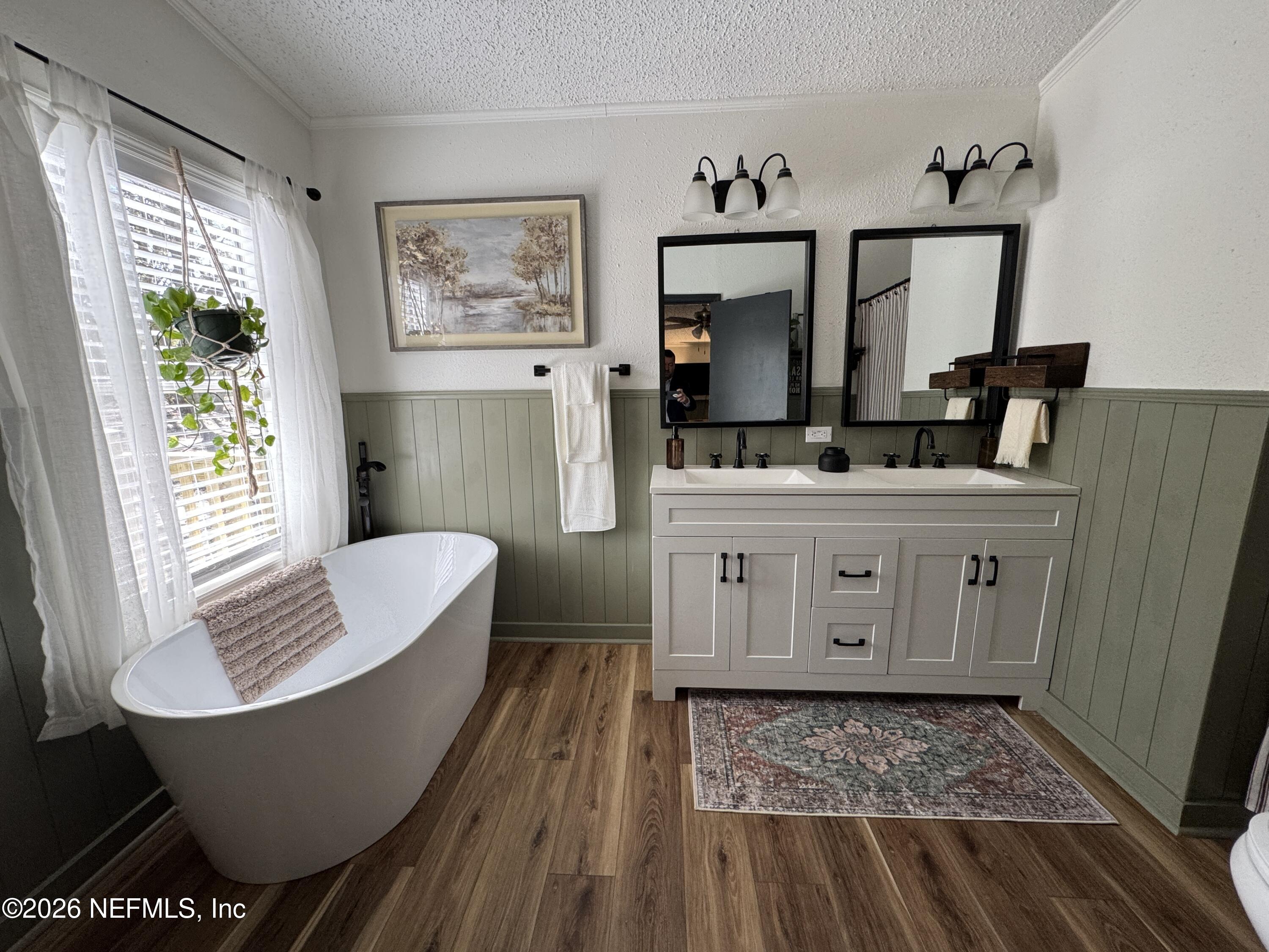7655 Long Lake Road Keystone Heights, FL 32656 - Photo 22 of 58 a living room with furniture and a wooden floor