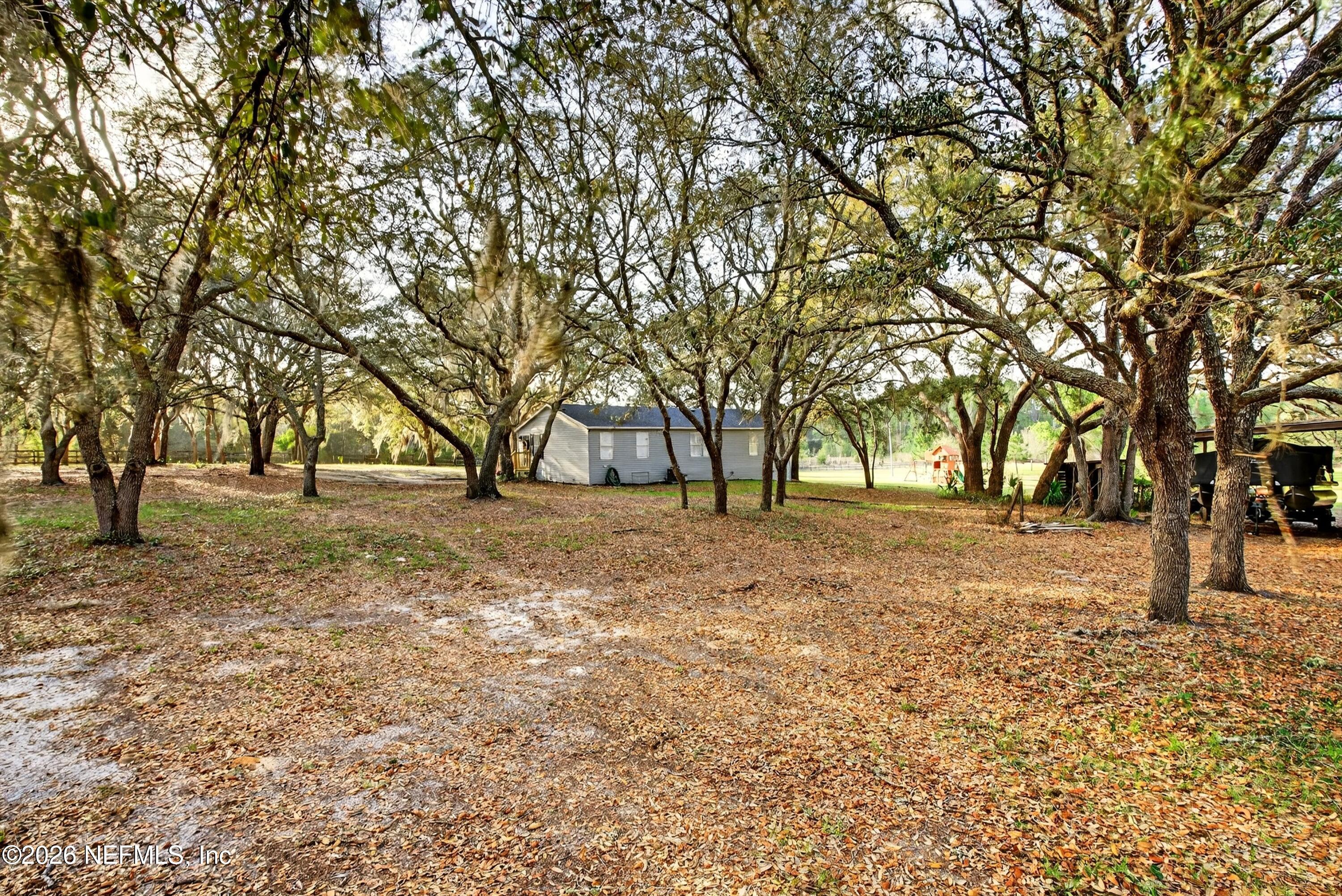 7655 Long Lake Road Keystone Heights, FL 32656 - Photo 44 of 58 a view of empty space with tree s