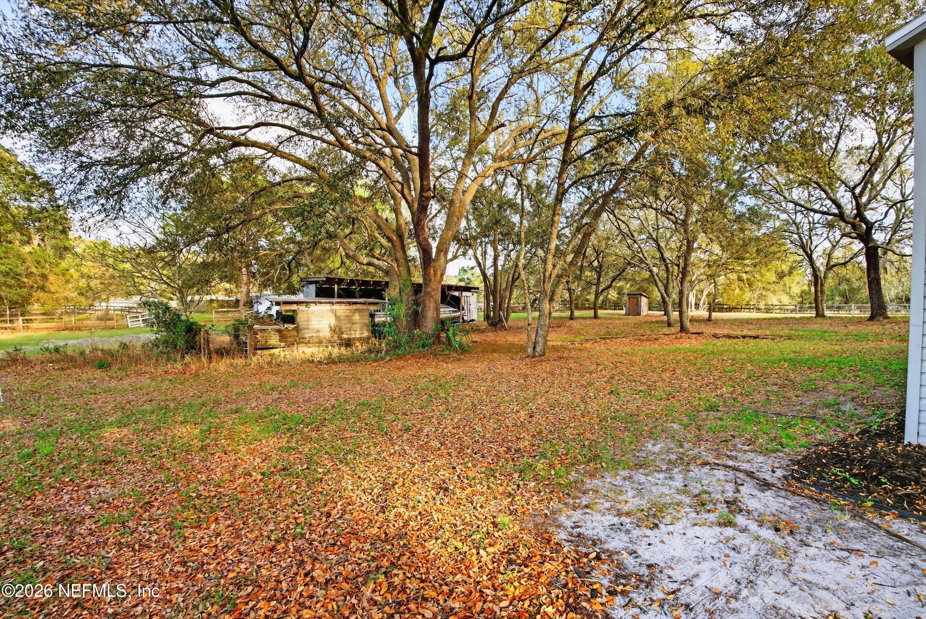 7655 Long Lake Road Keystone Heights, FL 32656 - Photo 46 of 58 a view of outdoor space with garden and trees