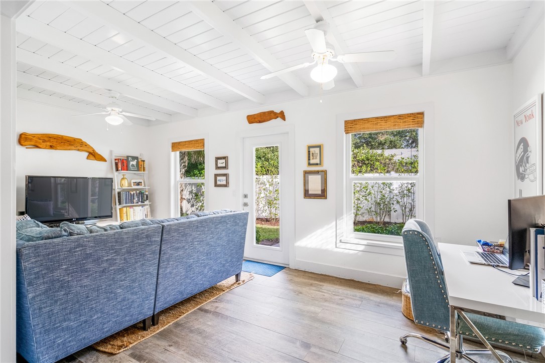 3816 Mockingbird Drive Vero Beach, FL 32963 - Photo 17 of 28 a living room with furniture and a flat screen tv