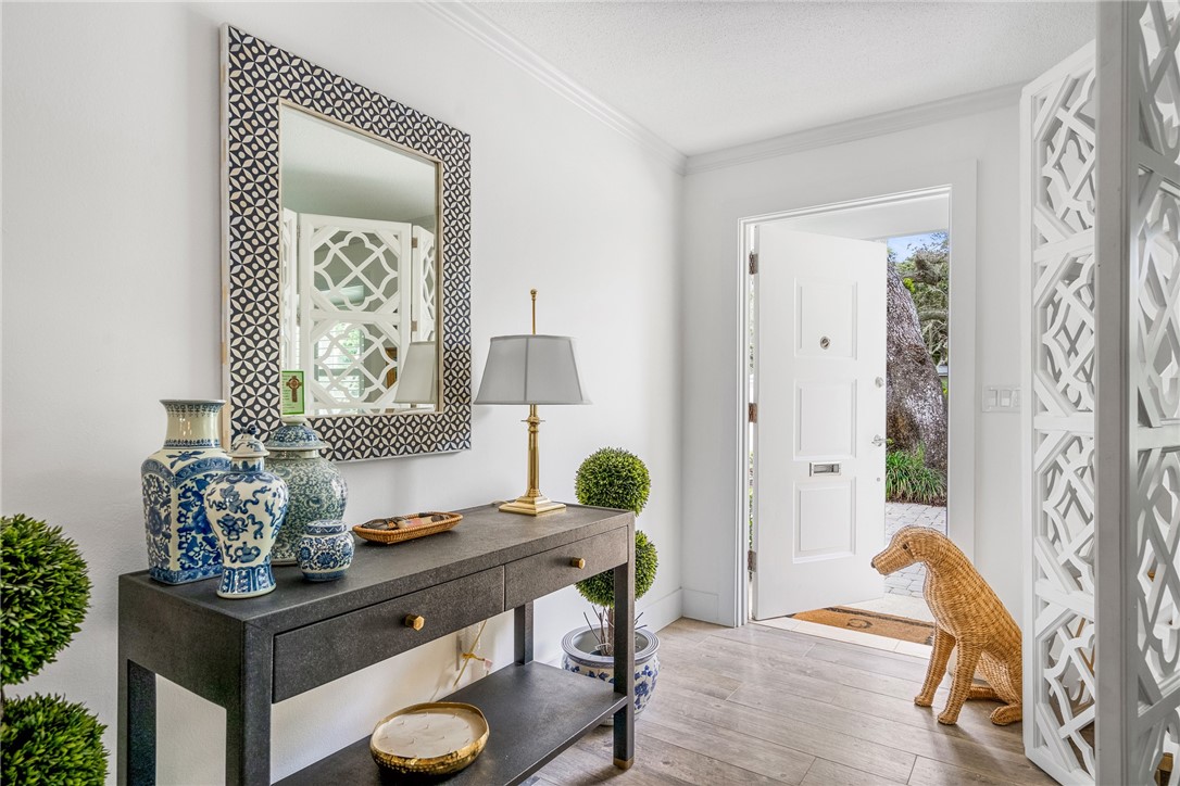 3816 Mockingbird Drive Vero Beach, FL 32963 - Photo 3 of 28 a living room with furniture and wooden floor