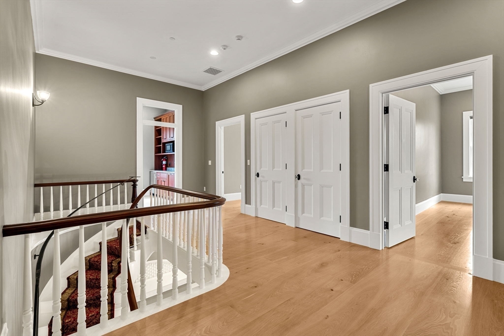 186 Main Street Groton, MA 01450 - Photo 19 of 42 a view of a hallway with wooden floor
