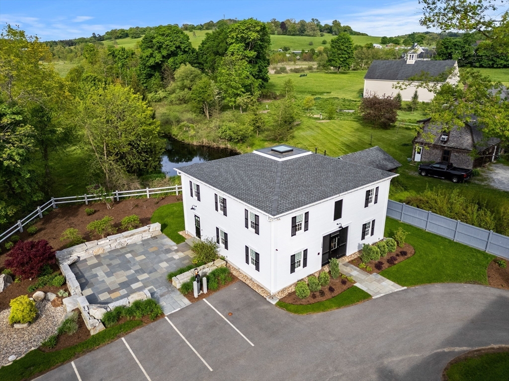 186 Main Street Groton, MA 01450 - Photo 32 of 42 aerial view of a house with a yard