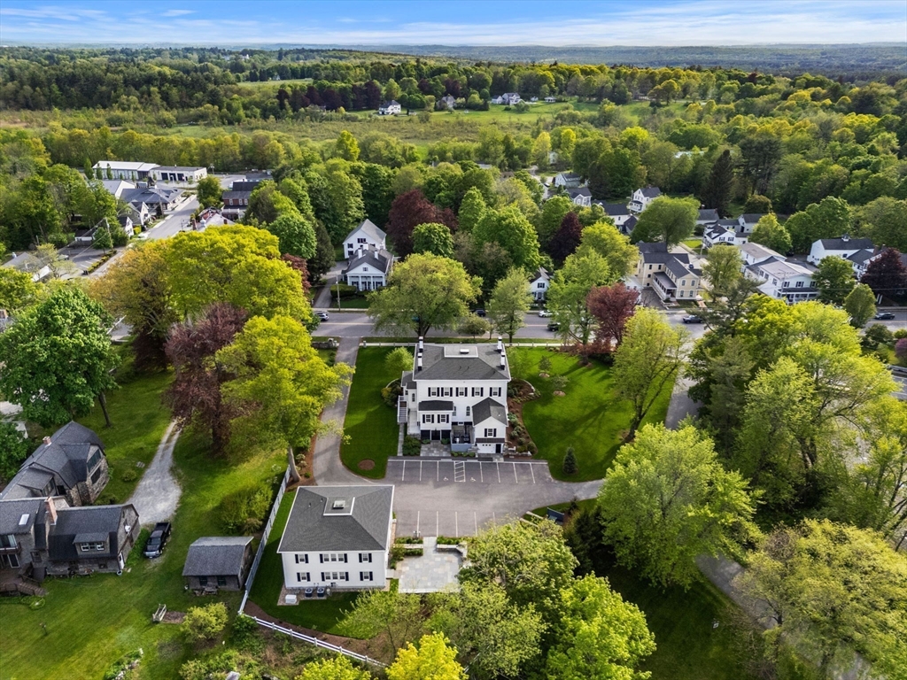 186 Main Street Groton, MA 01450 - Photo 39 of 42 an aerial view of a house with a yard