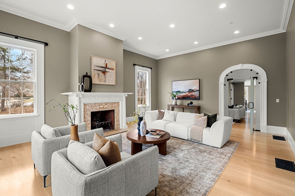 186 Main Street Groton, MA 01450 - Photo 5 of 42 a living room with furniture and a fireplace