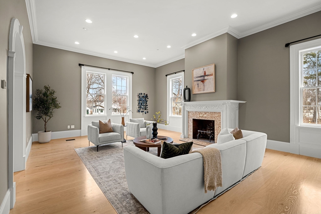 186 Main Street Groton, MA 01450 - Photo 6 of 42 a living room with furniture and a fireplace