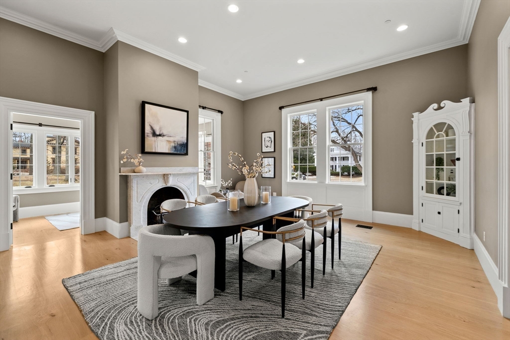 186 Main Street Groton, MA 01450 - Photo 9 of 42 a view of a a dining room with furniture window and wooden floor