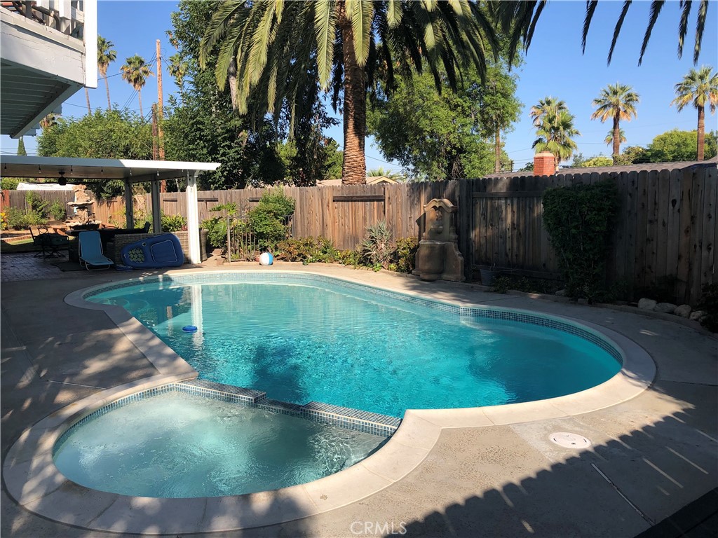 808 Orchard Drive, Unit B Redlands, CA 92374 - Photo 9 of 11 a view of a backyard with swimming pool
