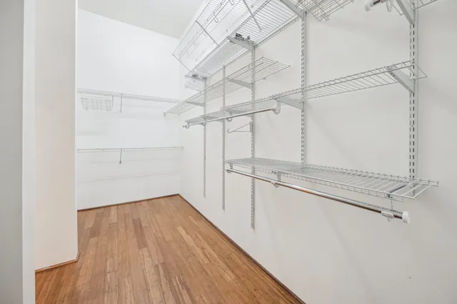 a view of a room with racks on the wall