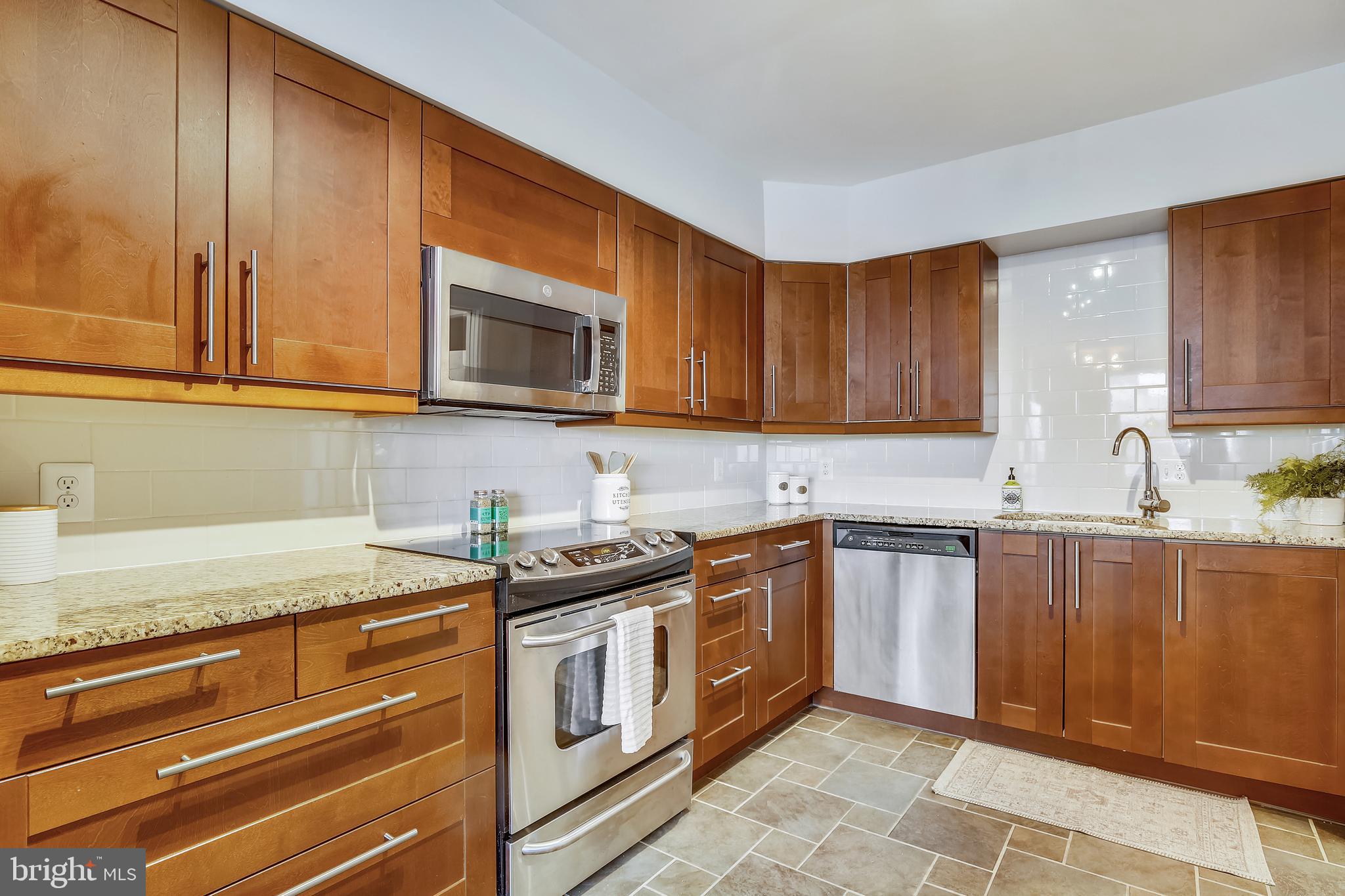 5501 Seminary Road, Unit 2615S Falls Church, VA 22041 - Photo 12 of 41 Granite countertops & subway tile backsplash