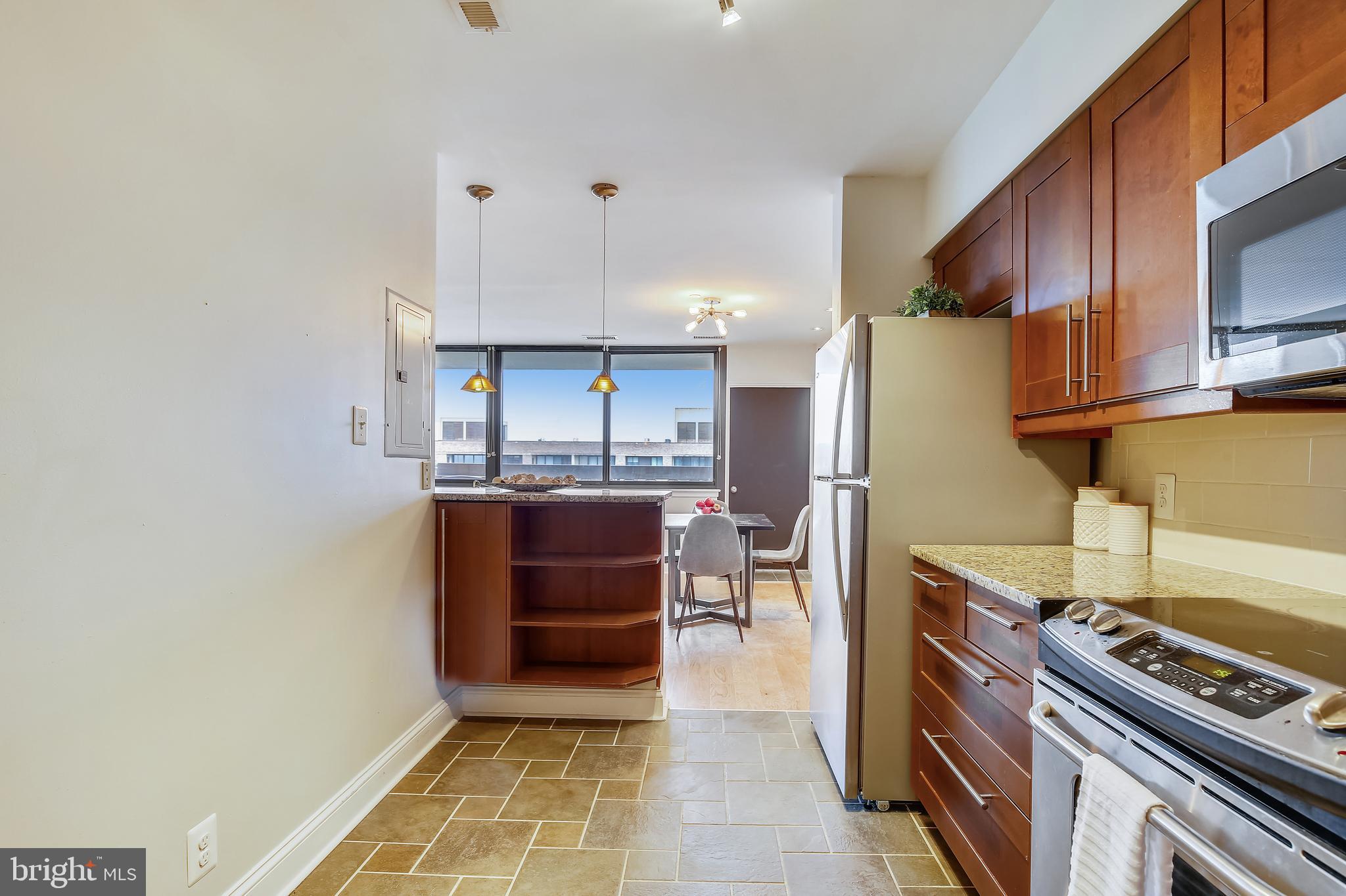 5501 Seminary Road, Unit 2615S Falls Church, VA 22041 - Photo 14 of 41 Storage & display cabinet below breakfast bar