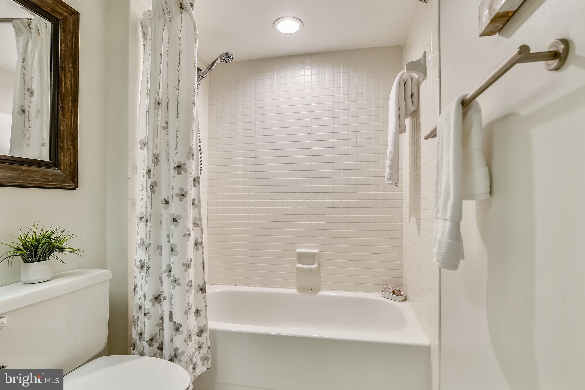 5501 Seminary Road, Unit 2615S Falls Church, VA 22041 - Photo 22 of 41 Tiled shower with overhead lighting
