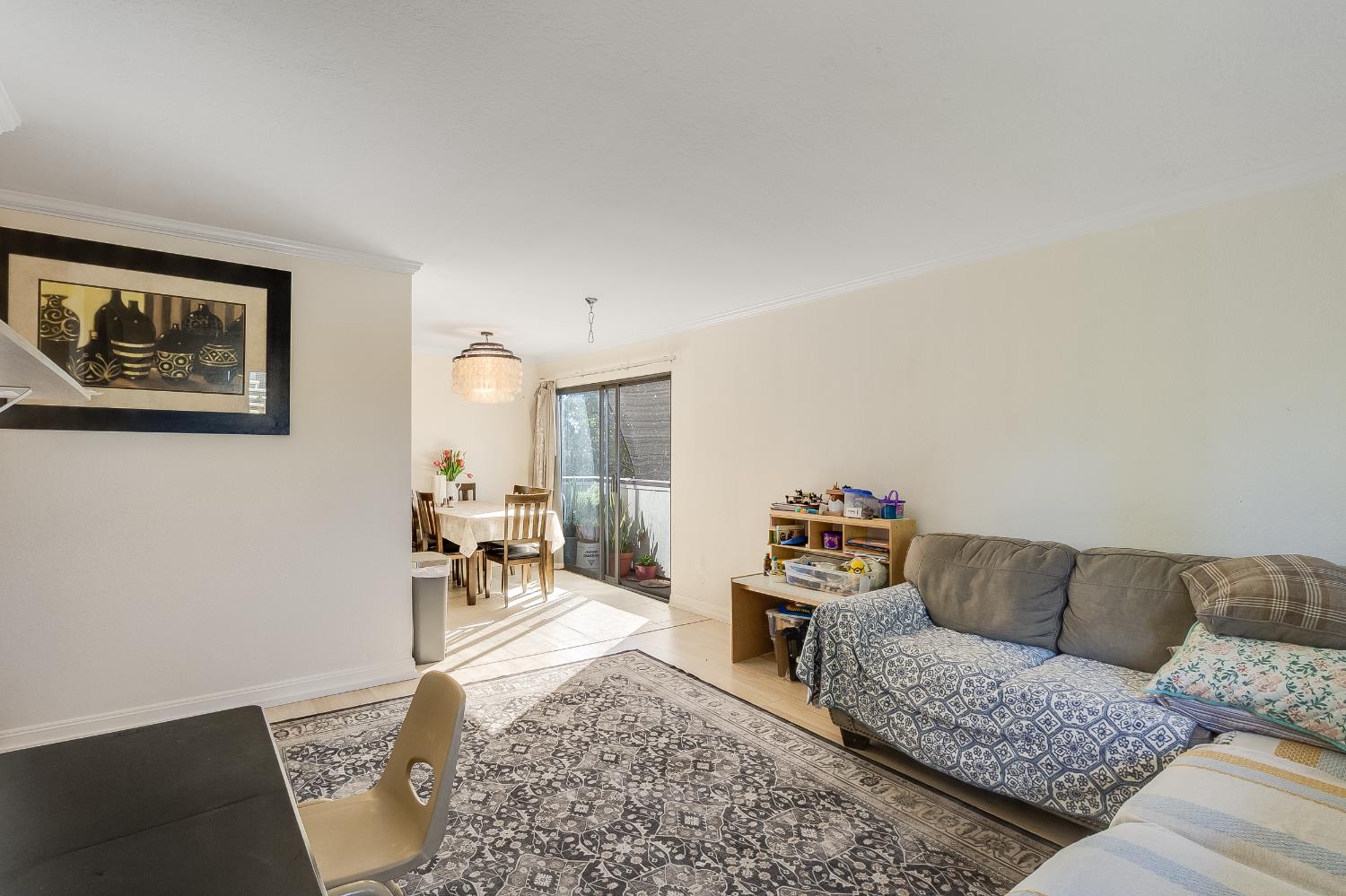 1699 Laguna Street, Unit 302 Concord, CA 94520 - Photo 15 of 30 a living room with furniture and a couch