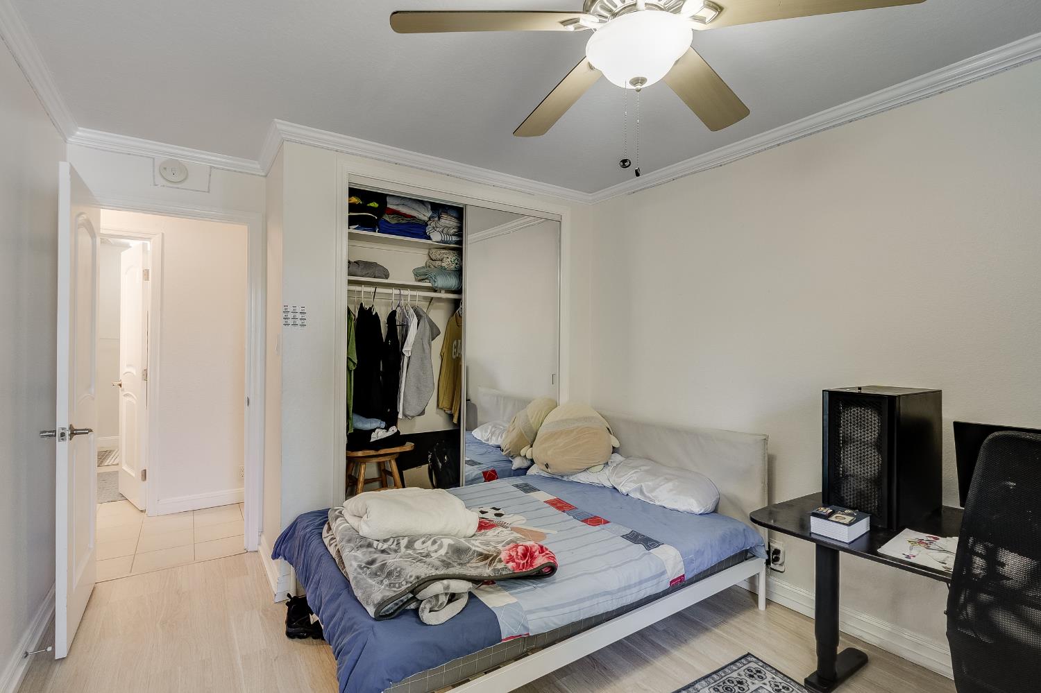 1699 Laguna Street, Unit 302 Concord, CA 94520 - Photo 21 of 30 a bedroom with a bed and a chandelier