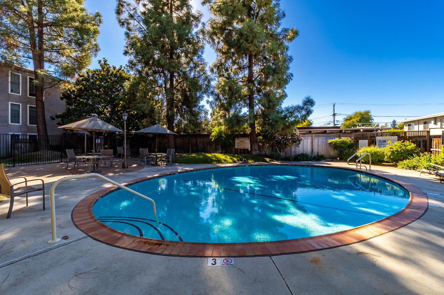 1699 Laguna Street, Unit 302 Concord, CA 94520 - Photo 30 of 30 a view of a swimming pool with a yard