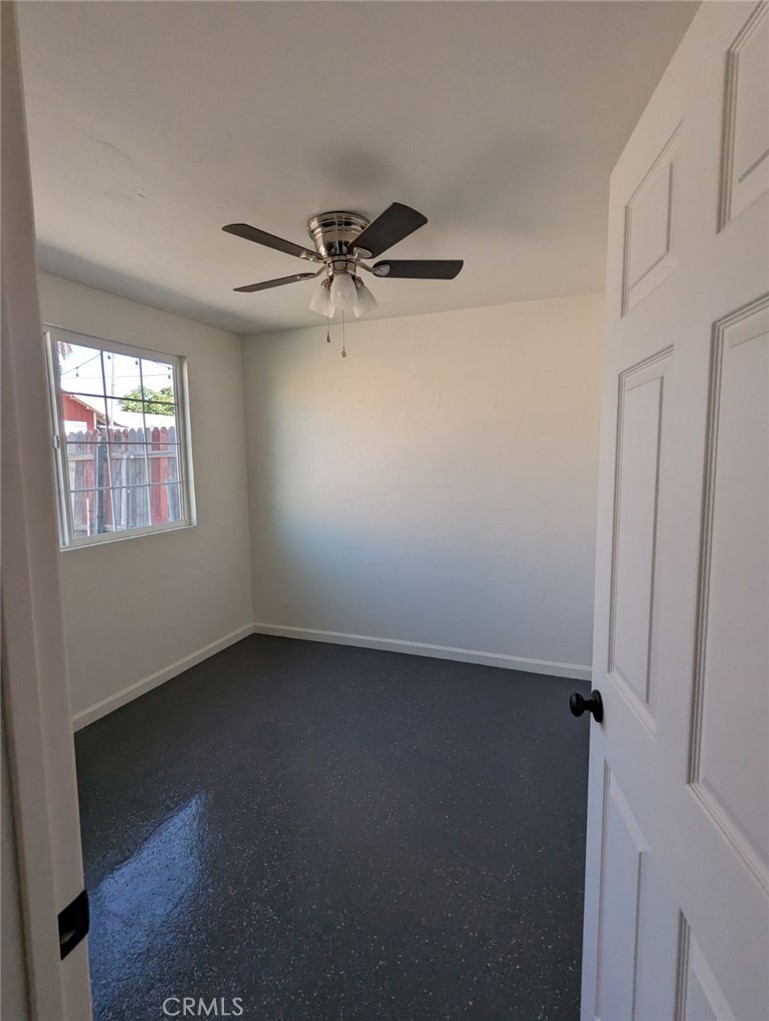 2886 Cridge Street Riverside, CA 92507 - Photo 15 of 21 a view of an empty room with a window