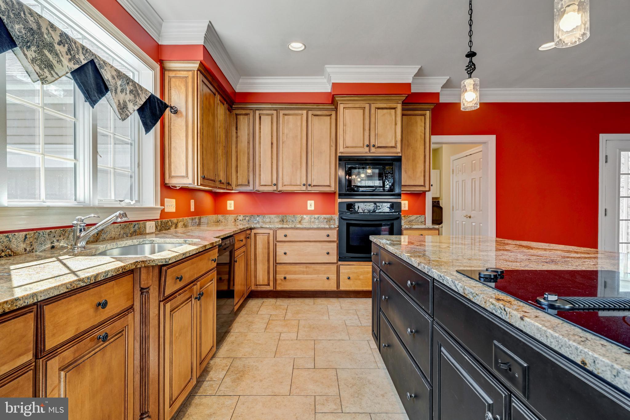 8986 Woodward Road Marshall, VA 20115 - Photo 11 of 45 a kitchen with stainless steel appliances granite countertop a sink and cabinets