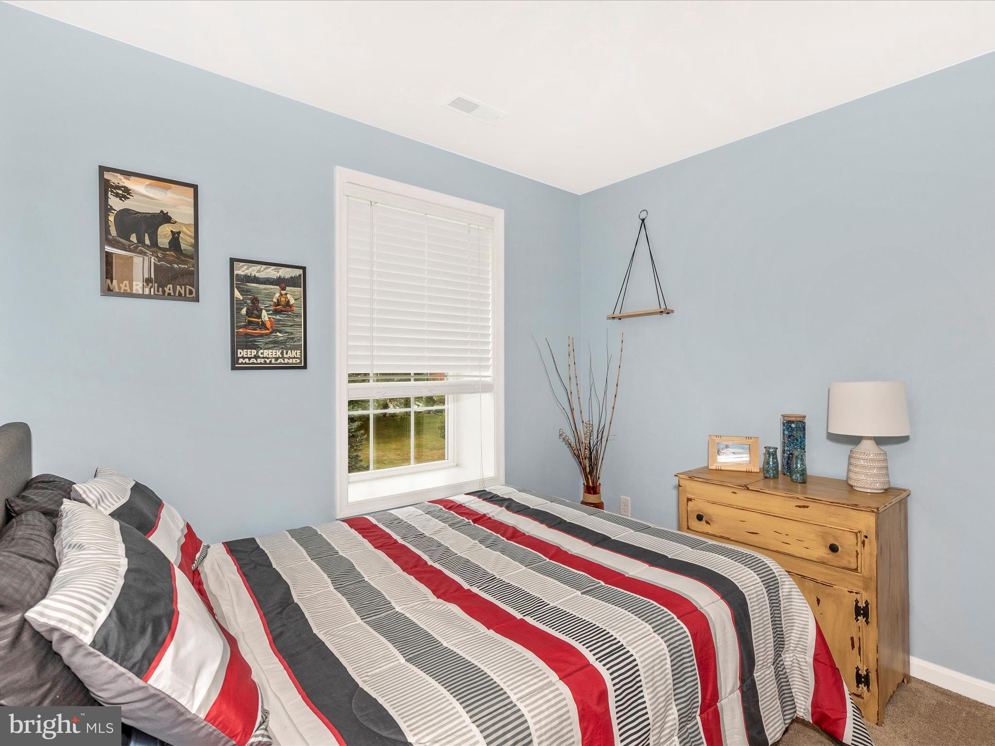 28 Brookside Avenue Hanover, PA 17331 - Photo 17 of 51 a bedroom with a bed and wooden floor