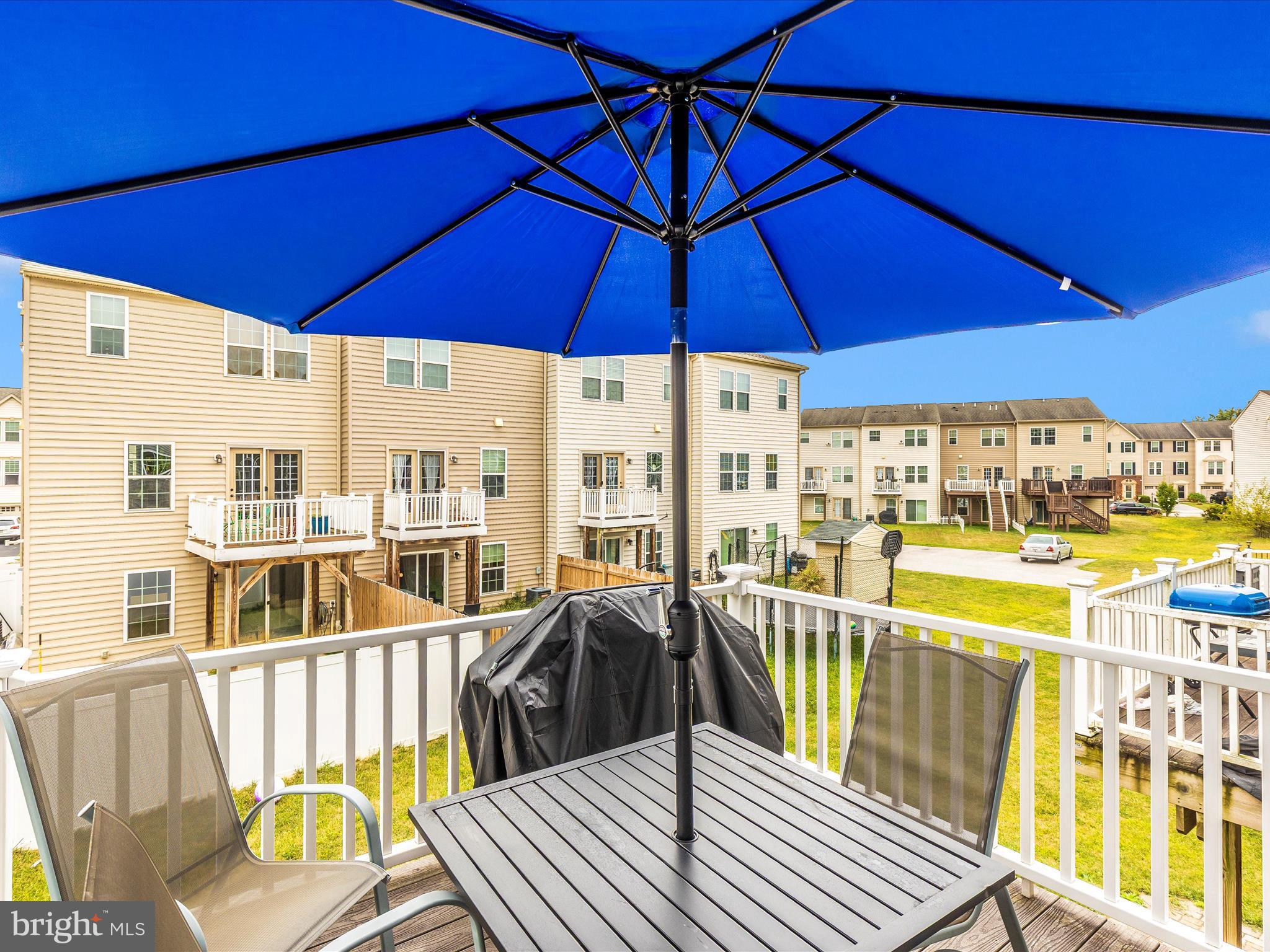 28 Brookside Avenue Hanover, PA 17331 - Photo 40 of 51 a view of a balcony with wooden floor and umbrella