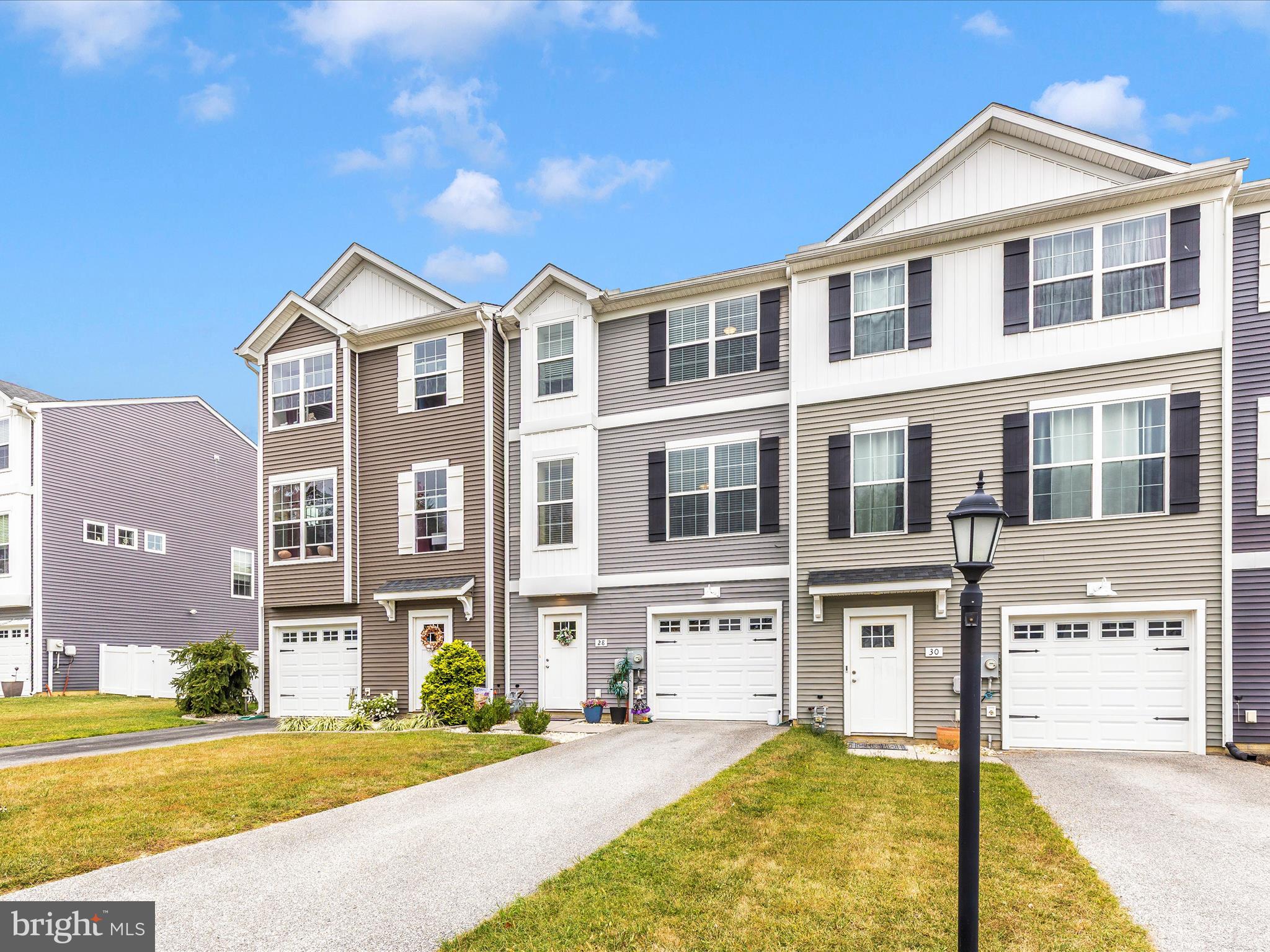 28 Brookside Avenue Hanover, PA 17331 - Photo 45 of 51 a front view of a residential apartment building with a yard