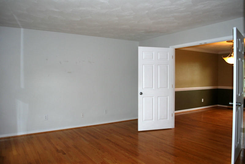 142 Piper Glenn Blue Ridge, VA 24064 - Photo 13 of 46 a view of an empty room with wooden floor