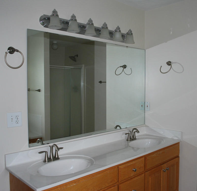 142 Piper Glenn Blue Ridge, VA 24064 - Photo 19 of 46 a bathroom with a sink and a mirror
