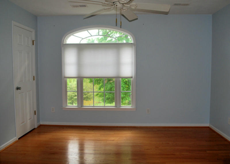 142 Piper Glenn Blue Ridge, VA 24064 - Photo 23 of 46 an empty room with wooden floor chandelier and window