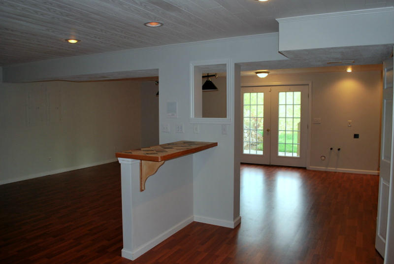 142 Piper Glenn Blue Ridge, VA 24064 - Photo 29 of 46 a view of an empty room with wooden floor and a window
