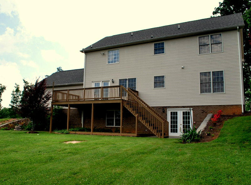 142 Piper Glenn Blue Ridge, VA 24064 - Photo 39 of 46 a front view of a house with a garden