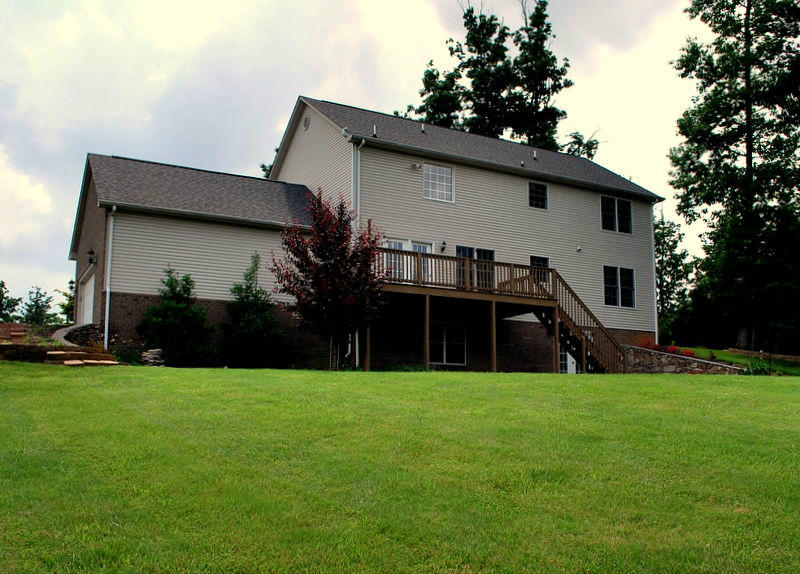 142 Piper Glenn Blue Ridge, VA 24064 - Photo 40 of 46 a view of a house with a yard and a porch