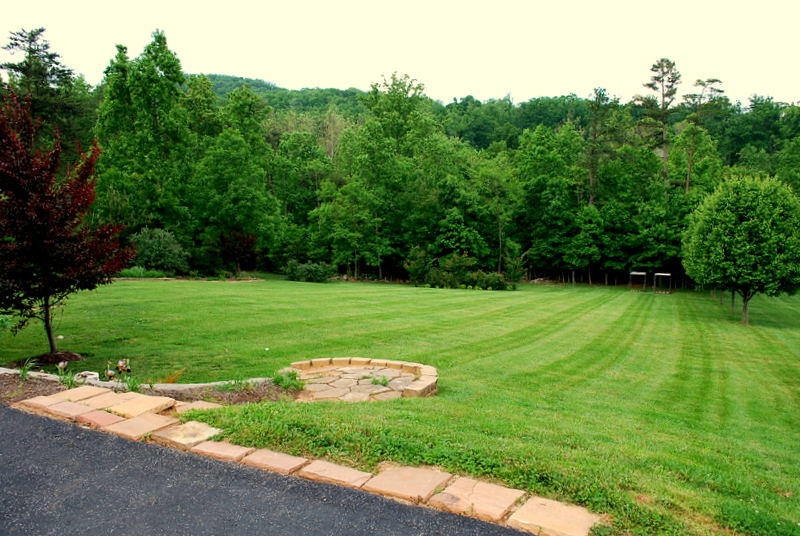 142 Piper Glenn Blue Ridge, VA 24064 - Photo 42 of 46 a view of a golf course with a garden