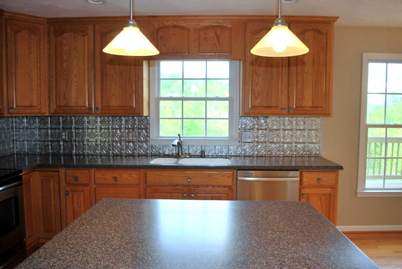 142 Piper Glenn Blue Ridge, VA 24064 - Photo 7 of 46 a kitchen with a sink a bath tub and a sink