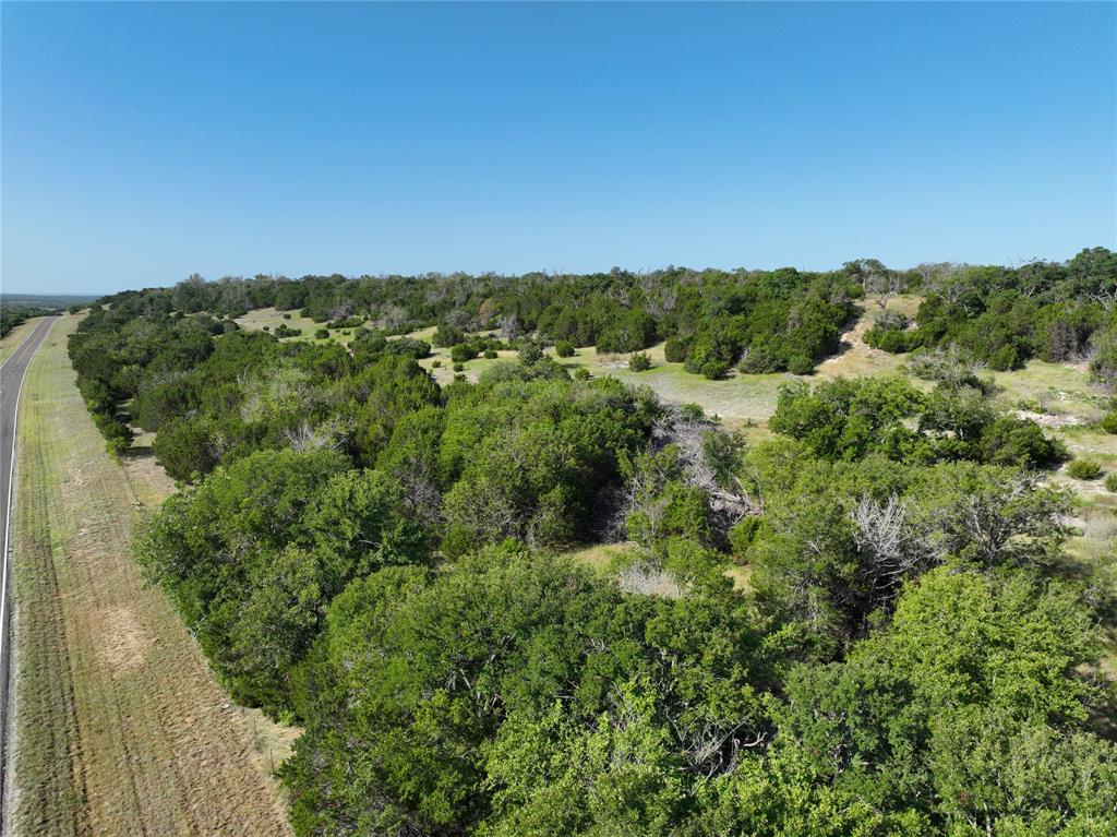 2414 - Tract 4 Evant, TX 76525 - Photo 15 of 27 a view of a green field with lots of bushes