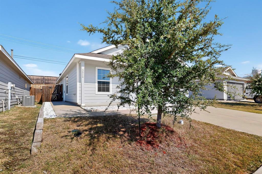 5516 McClelland Street Forney, TX 75126 - Photo 36 of 36 View of home's exterior featuring a central air condition unit and a patio