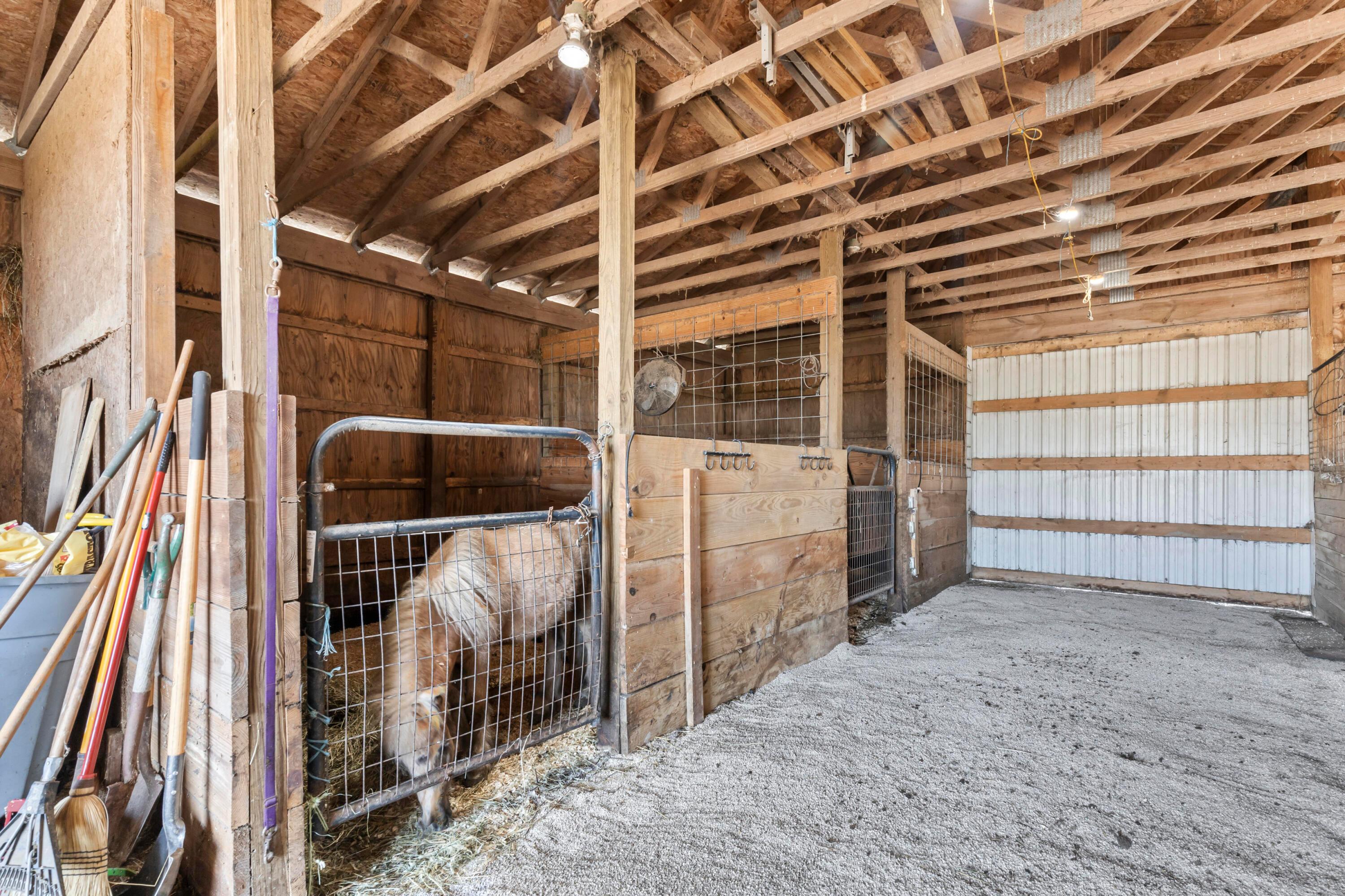 14040 Downing Road Croton, OH 43013 - Photo 53 of 66 • Aluminum exterior
• (3) stalls matted
• Man door
• (3) stalls with openings
to lean - to
• Water spigot
• Tack area