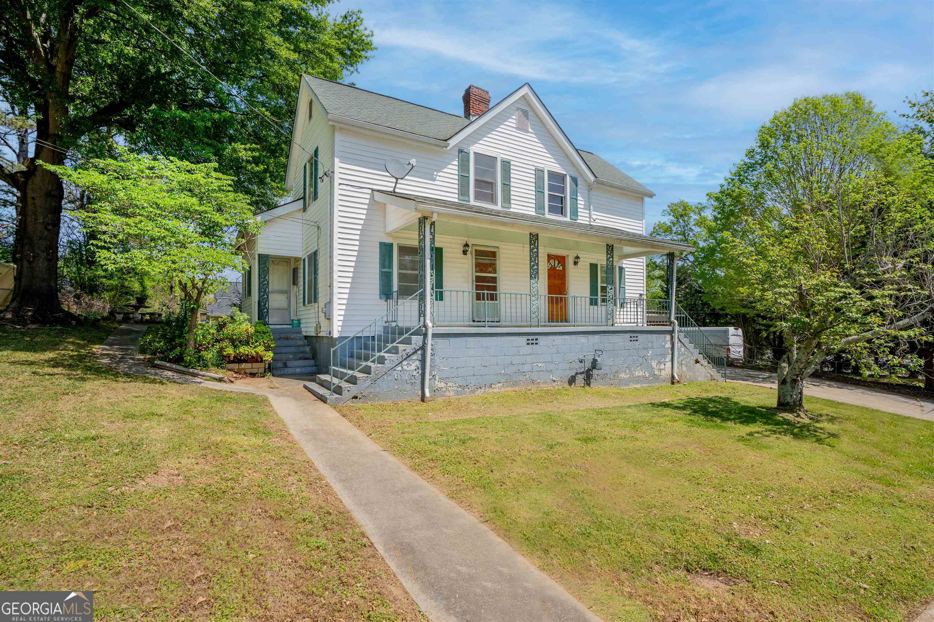 3 Liberty Street Gainesville, GA 30501 - Photo 1 of 1 a front view of a house with a yard