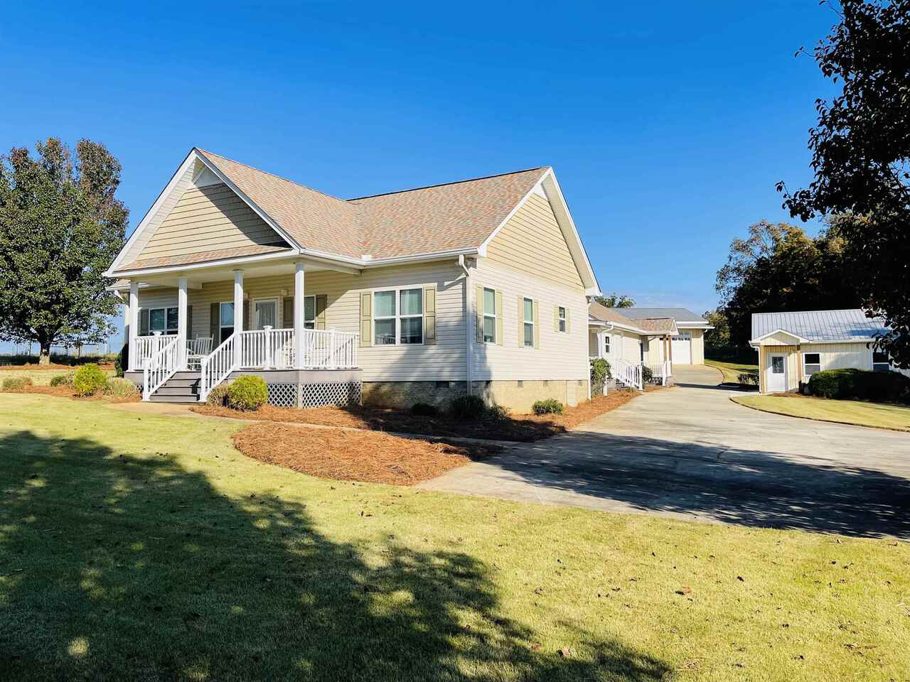 465 Antioch Road Franklin, GA 30217 - Photo 1 of 1 a view of a house with swimming pool and sitting area