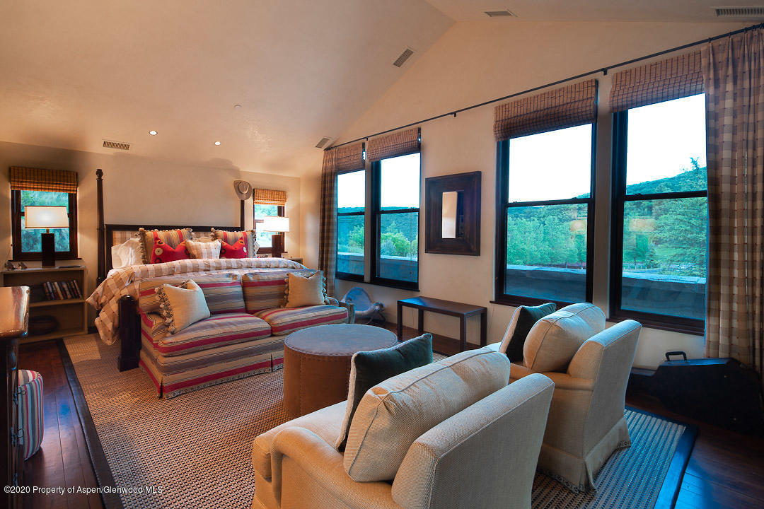 630 Spring Creek Road Basalt, CO 81621 - Photo 24 of 72 a living room with furniture and a large window