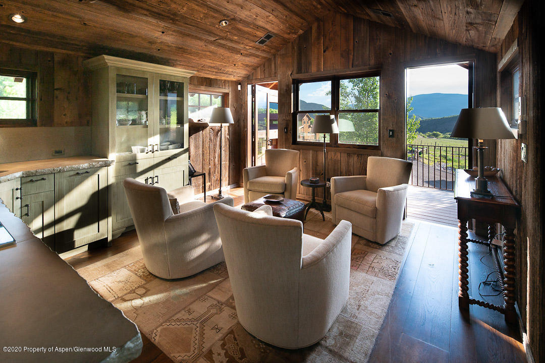 630 Spring Creek Road Basalt, CO 81621 - Photo 34 of 72 a living room with furniture and a table