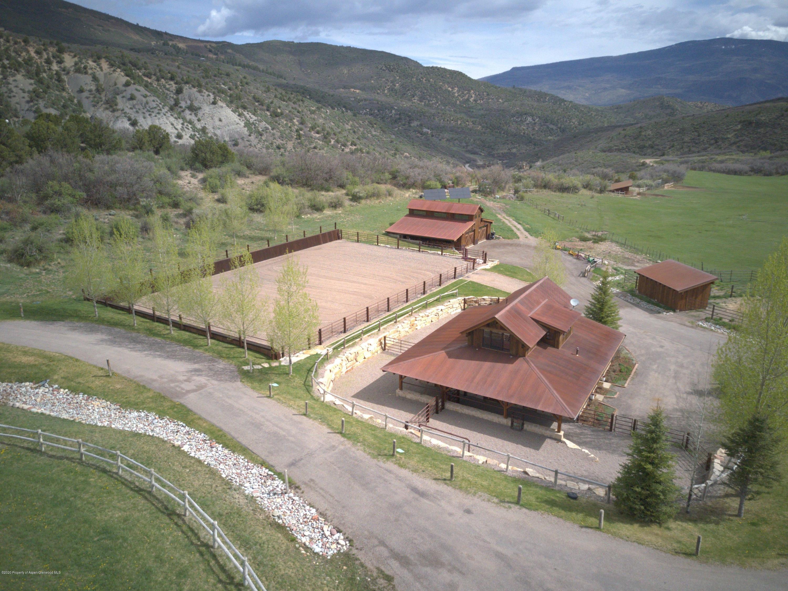 630 Spring Creek Road Basalt, CO 81621 - Photo 46 of 72 an aerial view of a house with a garden
