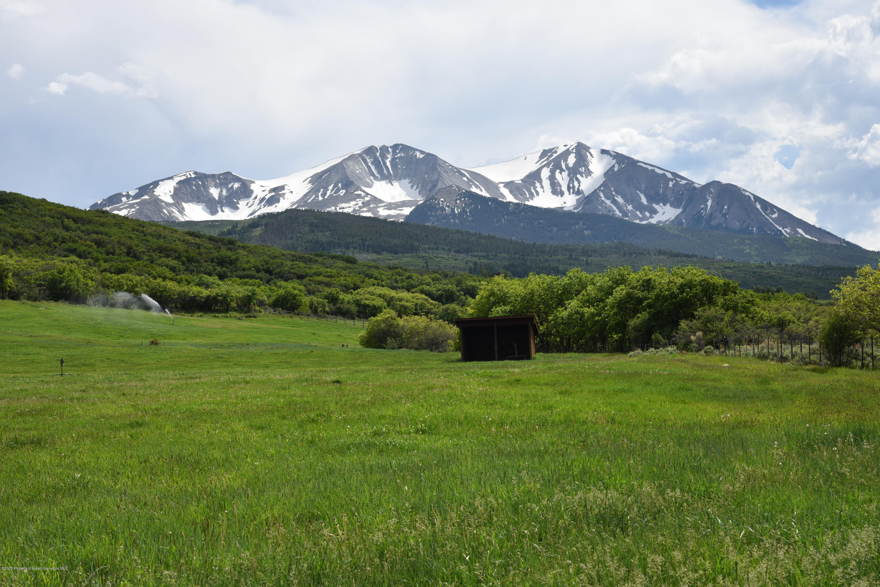 630 Spring Creek Road Basalt, CO 81621 - Photo 49 of 72 a view of a grassy field with an ocean view