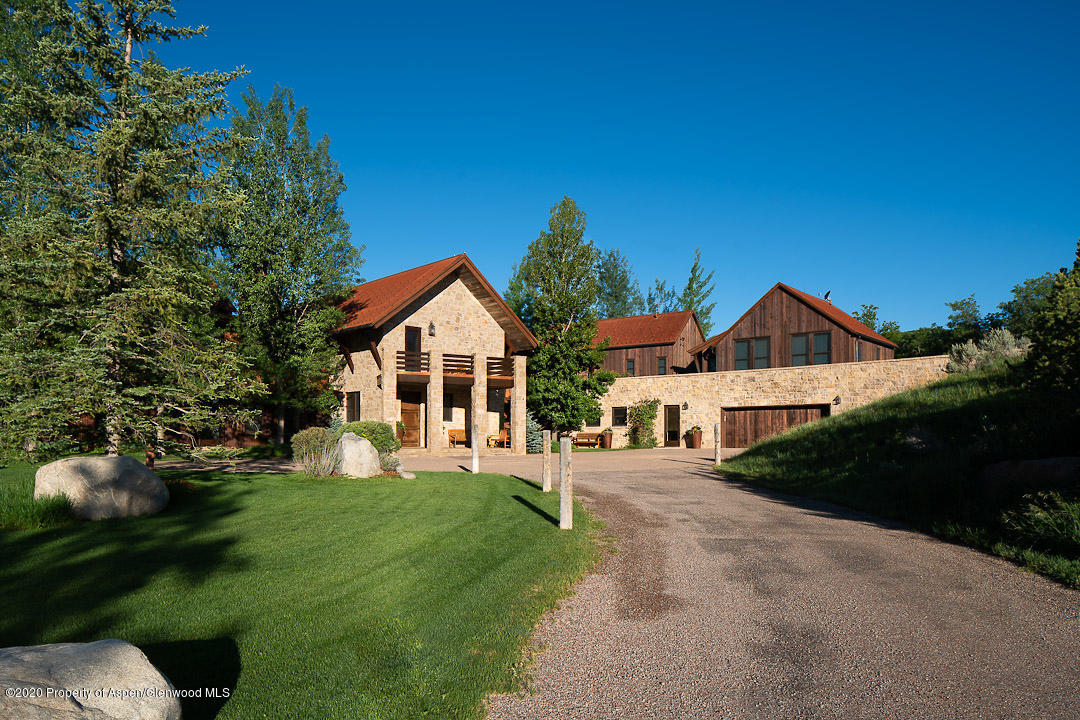 630 Spring Creek Road Basalt, CO 81621 - Photo 60 of 72 a front view of a house with a yard