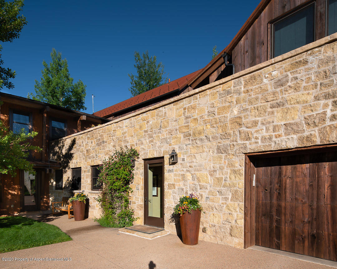 630 Spring Creek Road Basalt, CO 81621 - Photo 63 of 72 a front view of a house with a yard