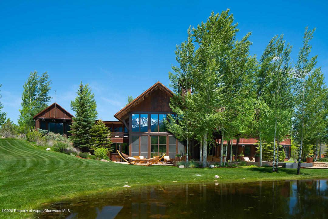 630 Spring Creek Road Basalt, CO 81621 - Photo 67 of 72 a front view of a house with a garden