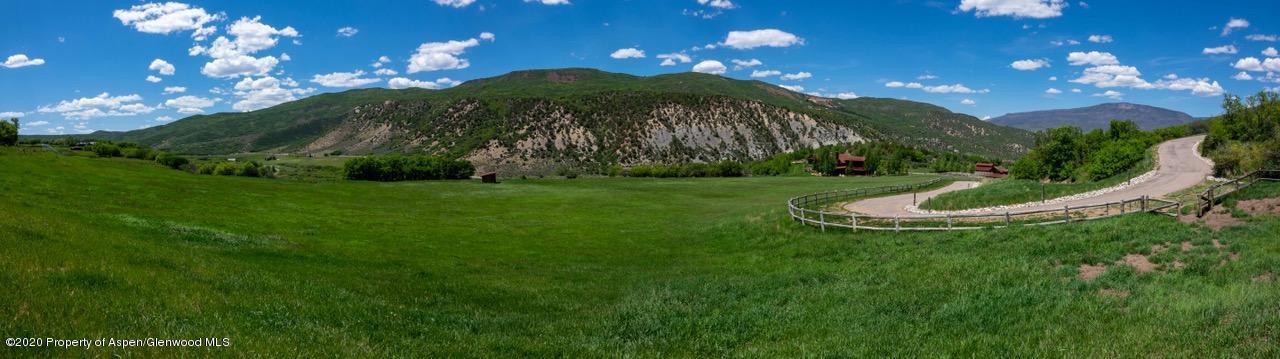 630 Spring Creek Road Basalt, CO 81621 - Photo 70 of 72 a view of a fountain in middle of the green field