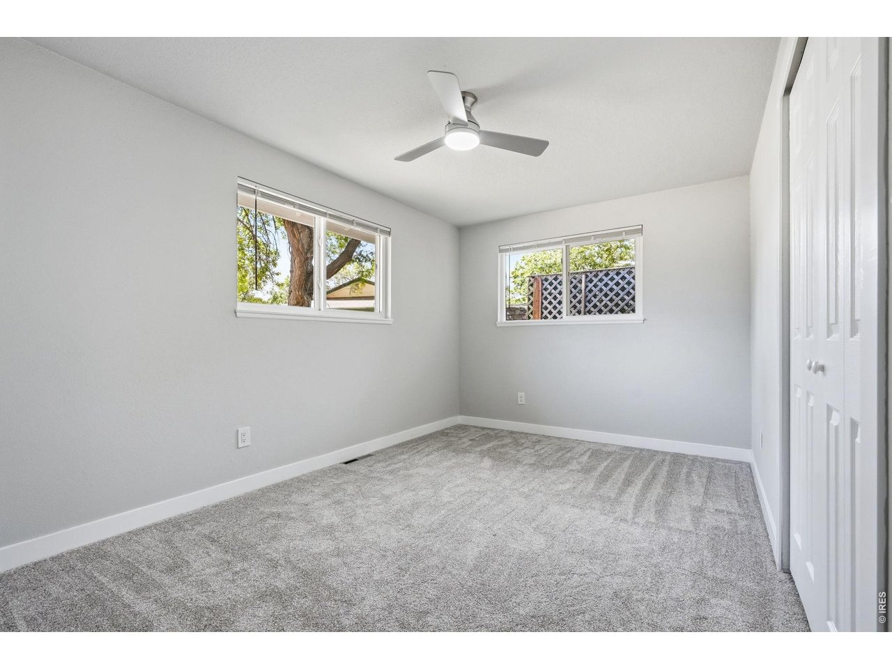 1035 6th Street Berthoud, CO 80513 - Photo 24 of 37 a view of an empty room with a window