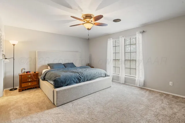 a bathroom with double vanity sink and a mirror