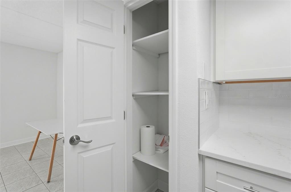 8921 Blind Pass Road, Unit 144 St. Pete Beach, FL 33706 - Photo 10 of 37 a bathroom with a shower